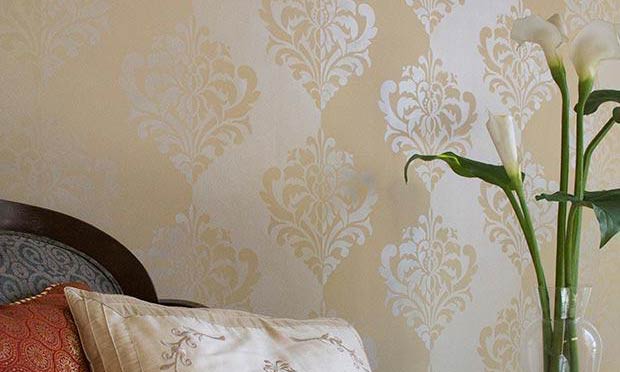 How to Stencil Inverted Designs on a Tone on Tone Striped Wall