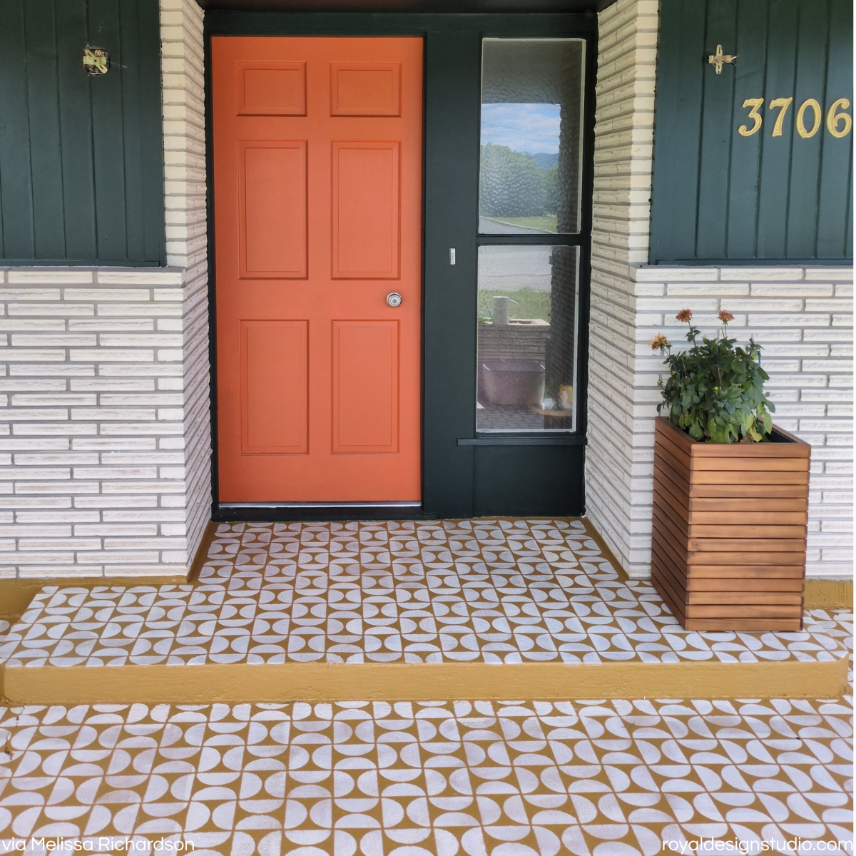 Mid century modern entry concrete porch stenciled with an art deco design stencil pattern in white on yellow