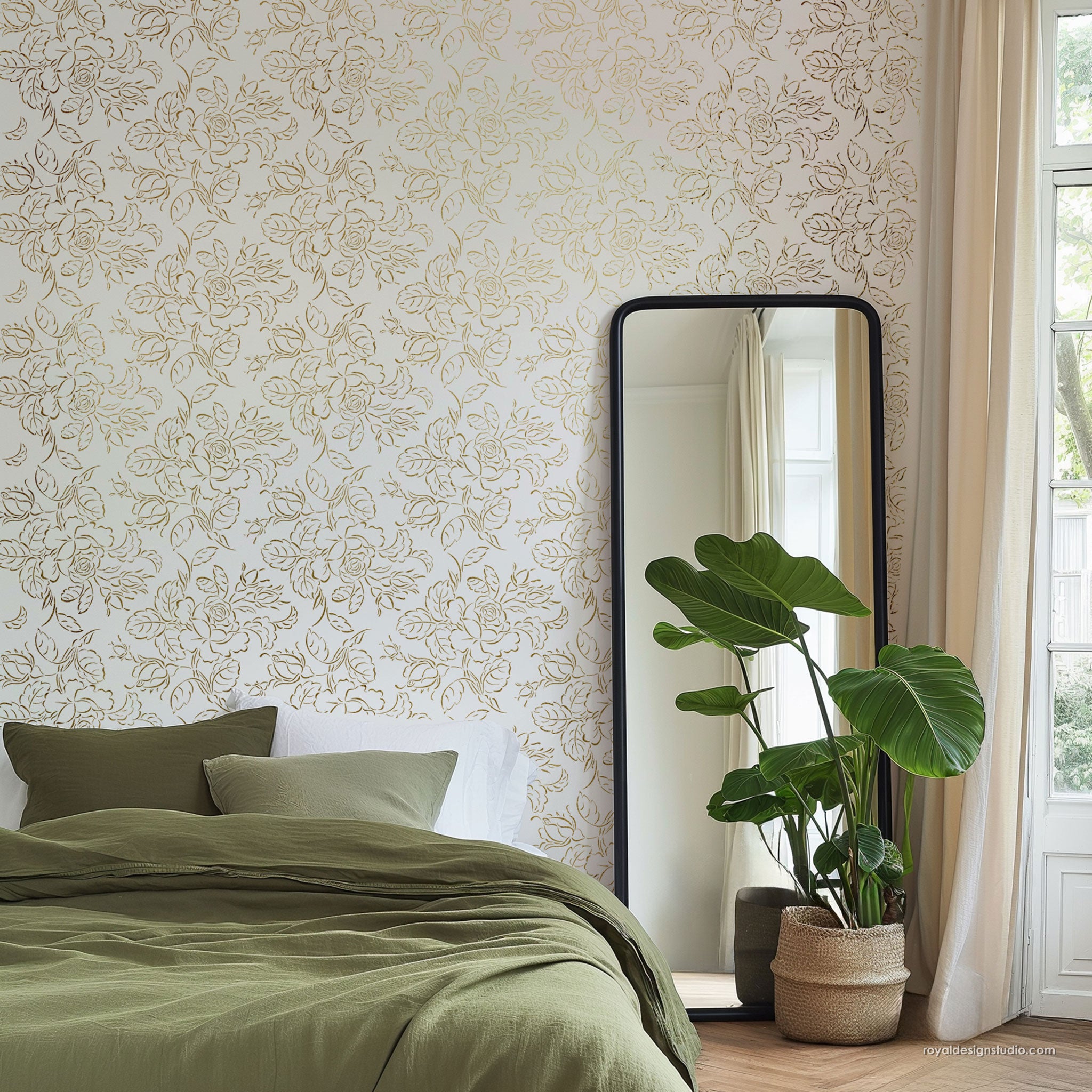Bedroom large rose pattern wall stencil with floral painted wallpaper look, green bedding, and a plant.