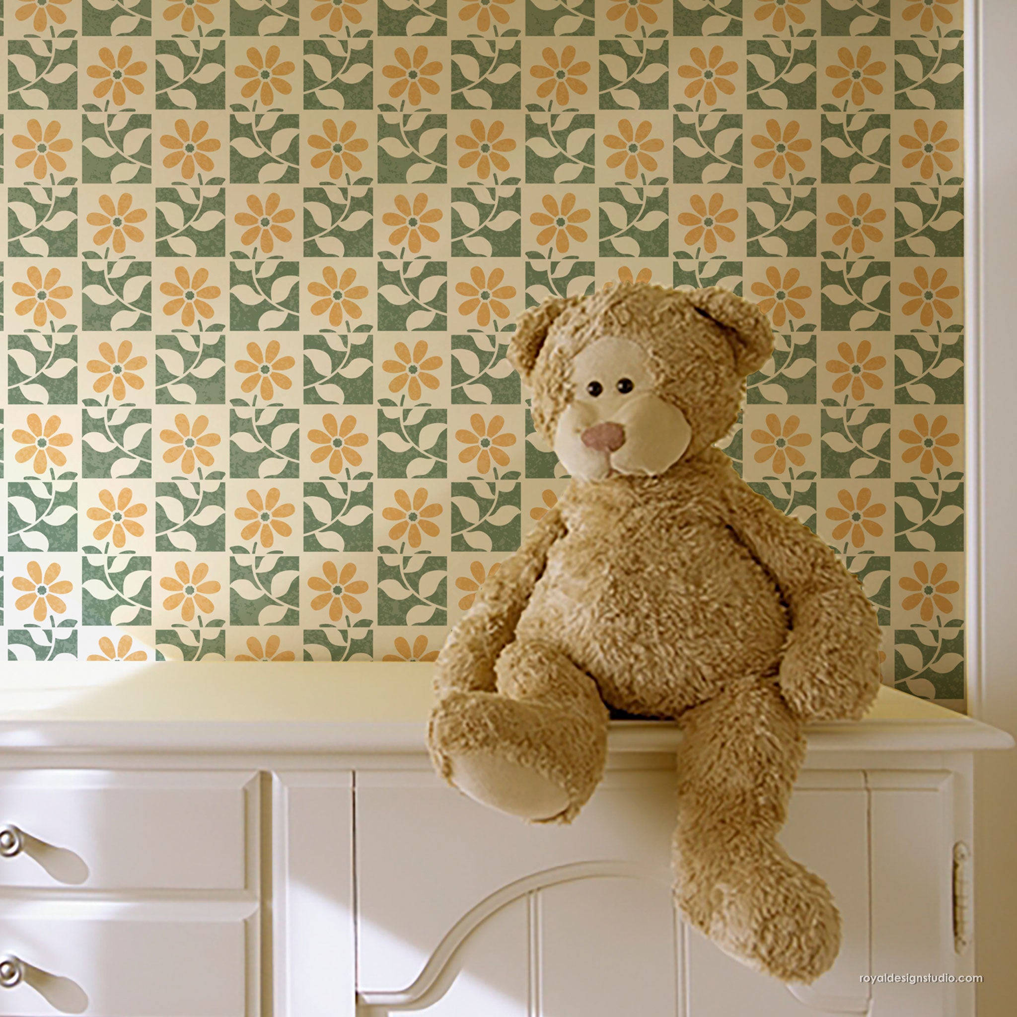 stenciling in a nursery using a cute floral tile wall stencil