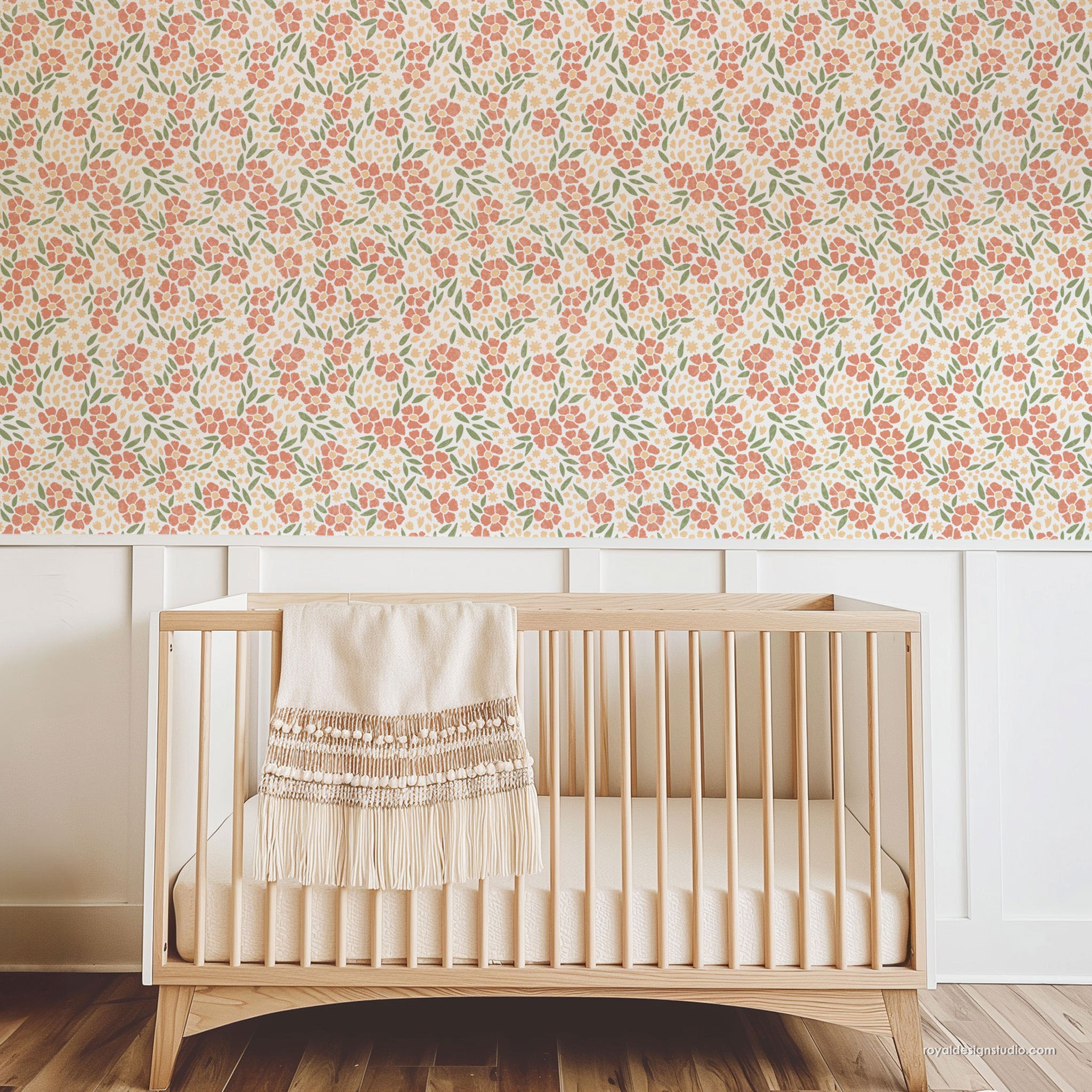 Ditsy floral wall stencil pattern painted in pastel colors on nursery walls