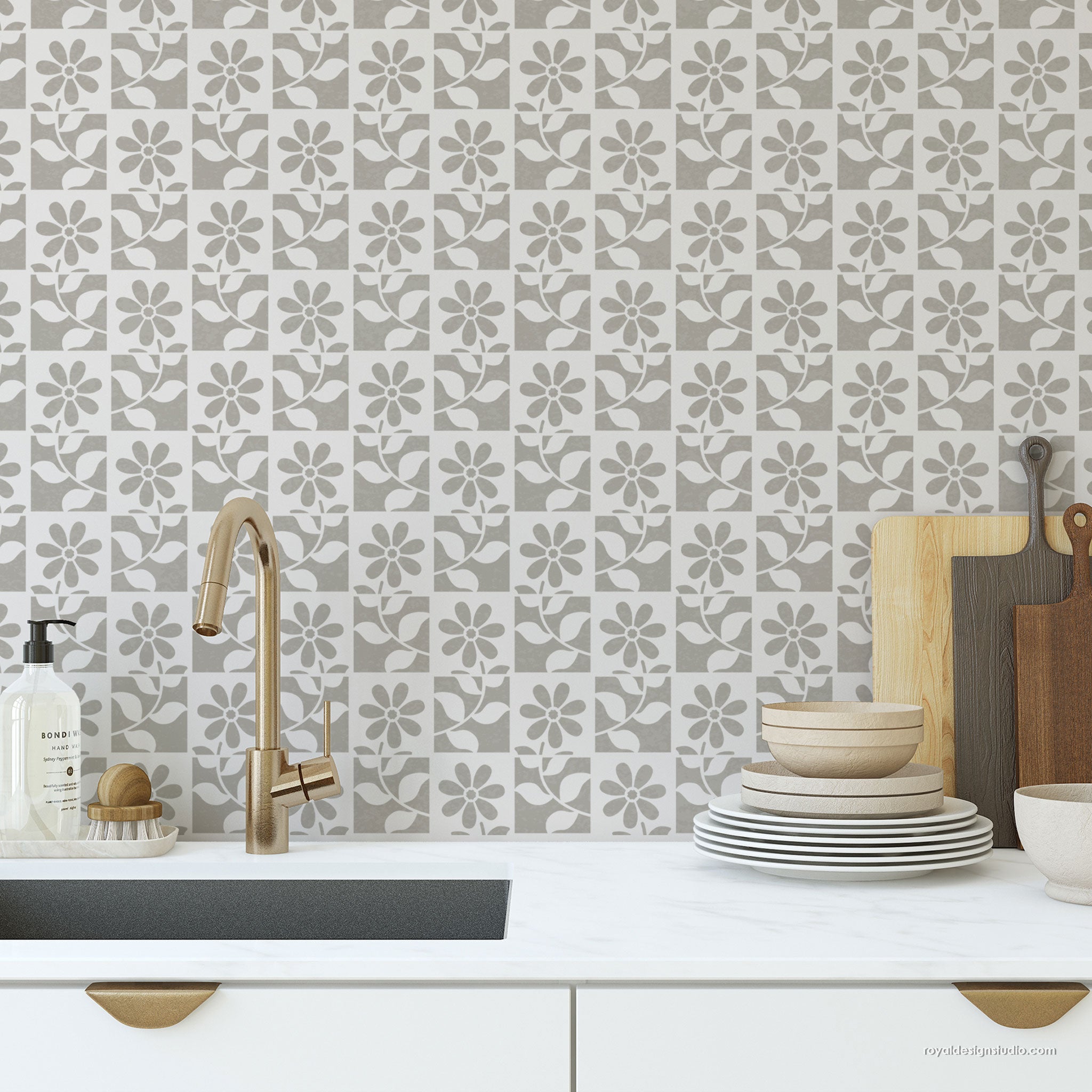 Kitchen with patterned tile backsplash, modern faucet, and wall stencil pattern on the wall