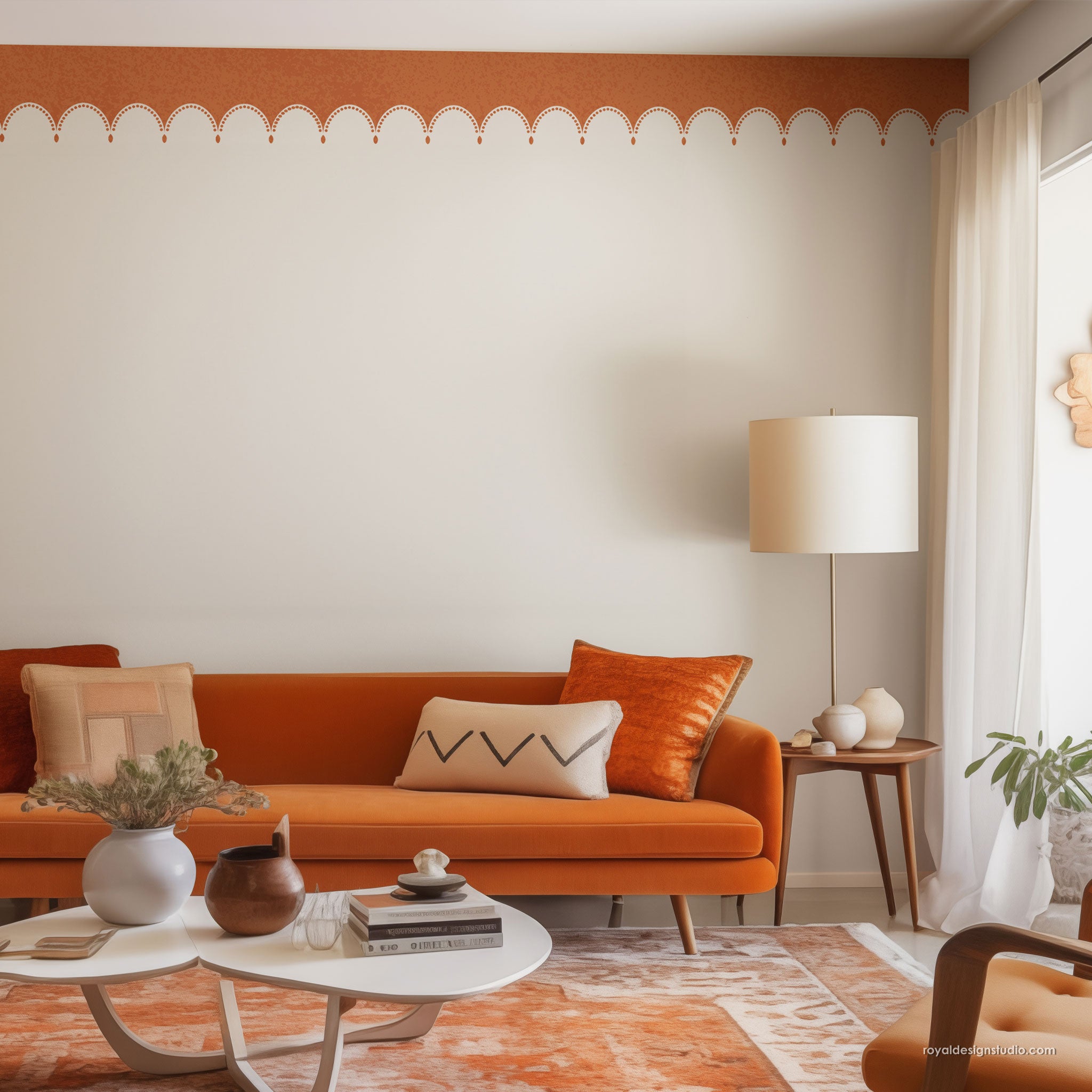 Stenciled ceiling in Living room with an orange sofa, white coffee table, and decorative elements.