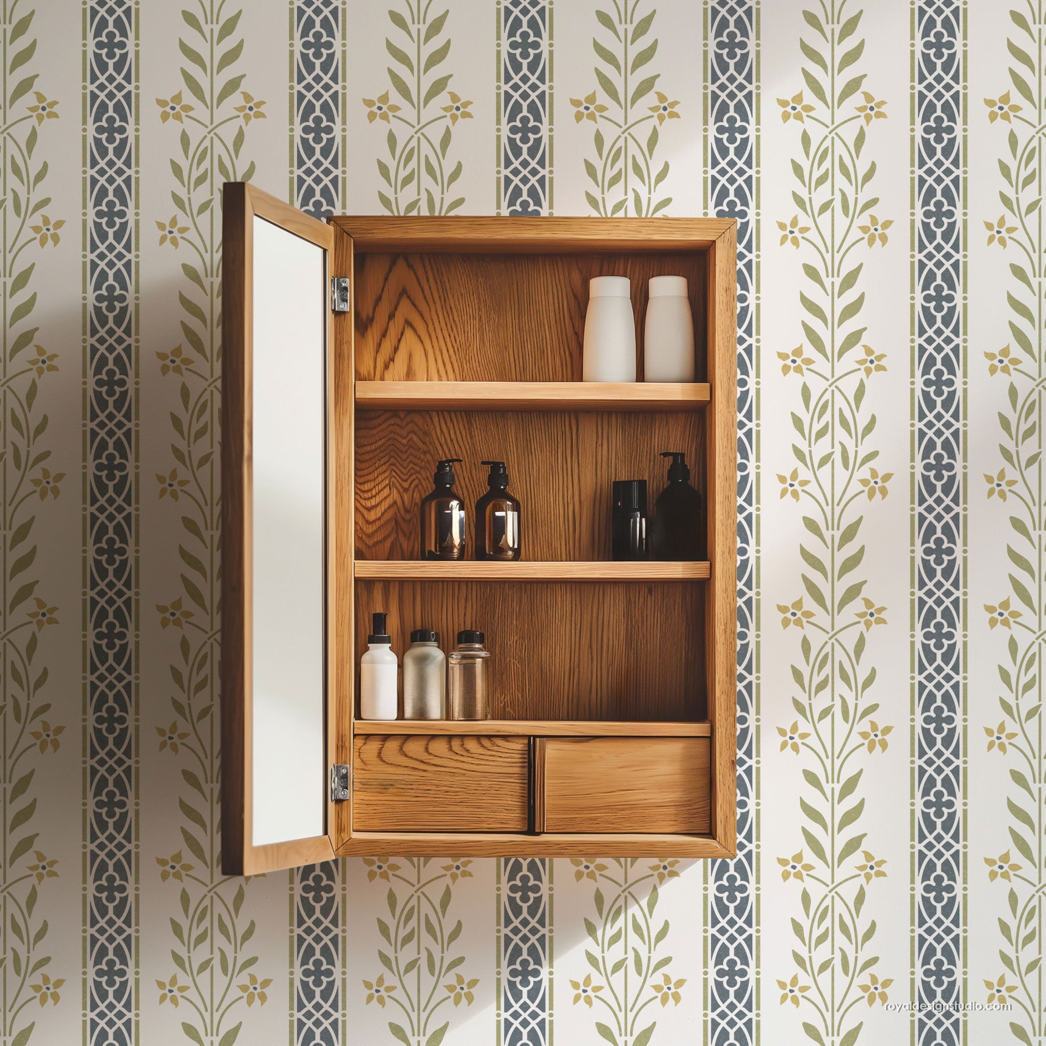 Wooden cabinet with shelves against a patterned wall painted with a floral stripe large wall stencil design