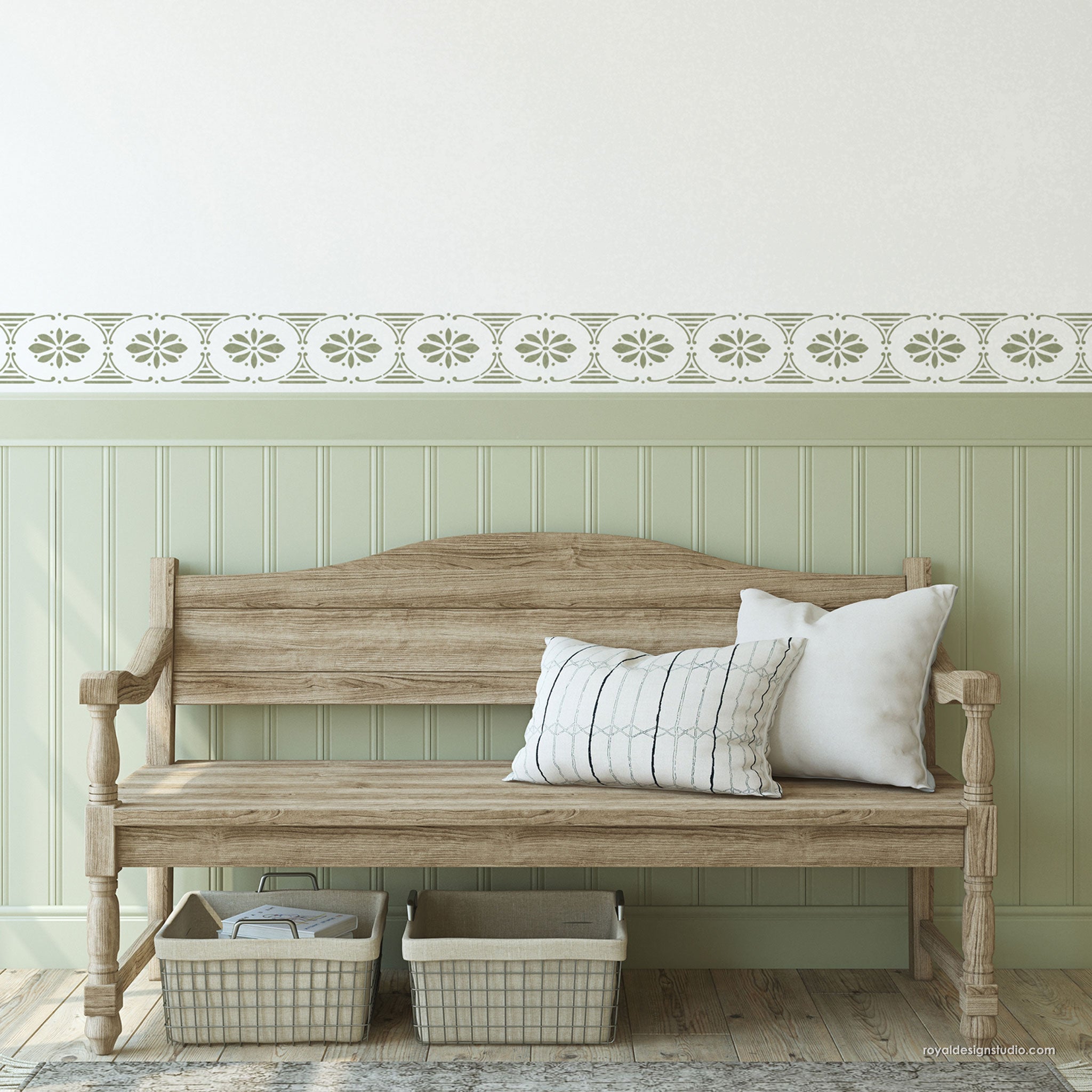 Scandinavian folk art floral border stencil on a wall with a rustic bench and pillows
