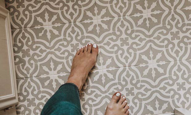 How to Paint Your Bathroom Floors with Tile Stencils