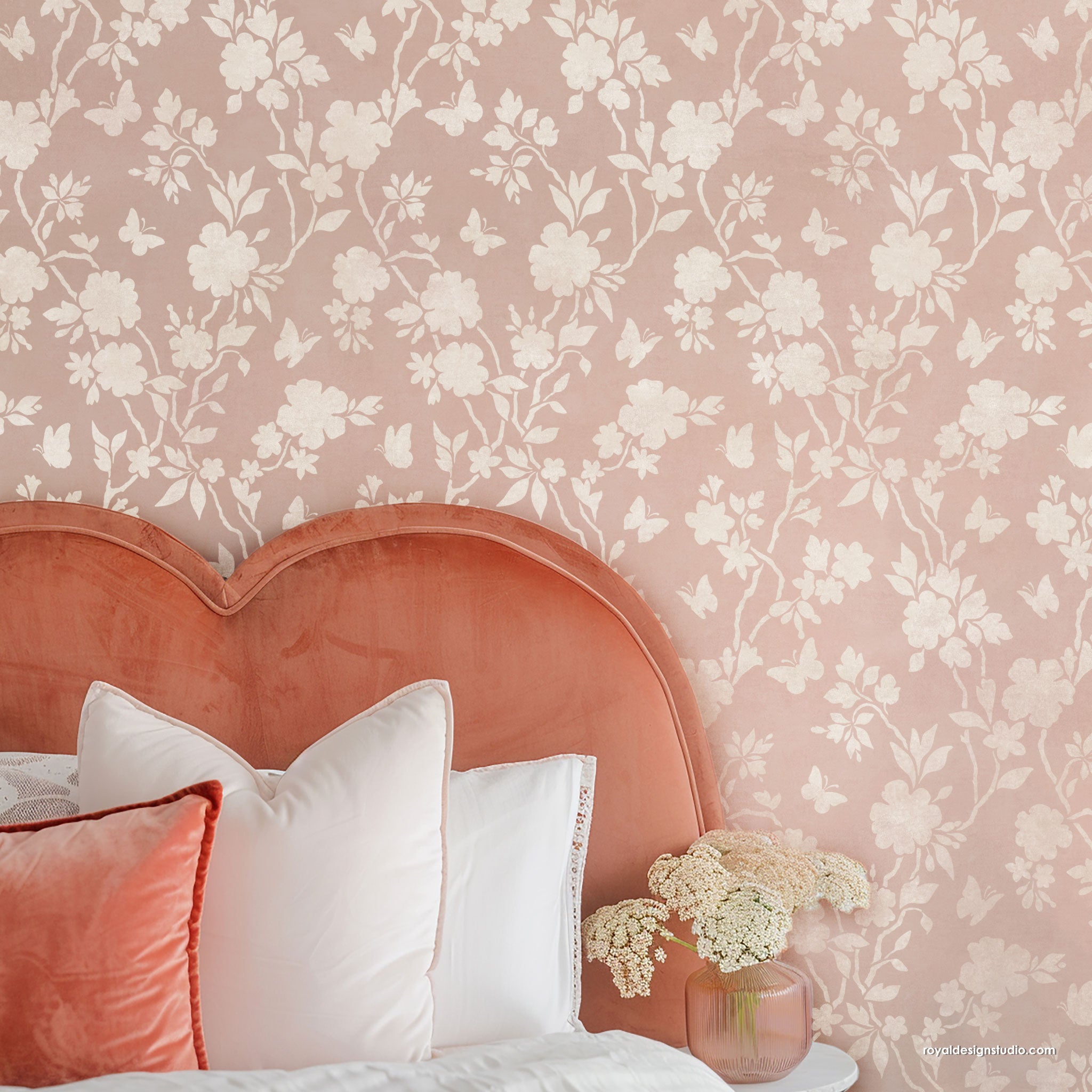 Large floral Chinoiserie wall stencil in bedroom stenciled in peach and white