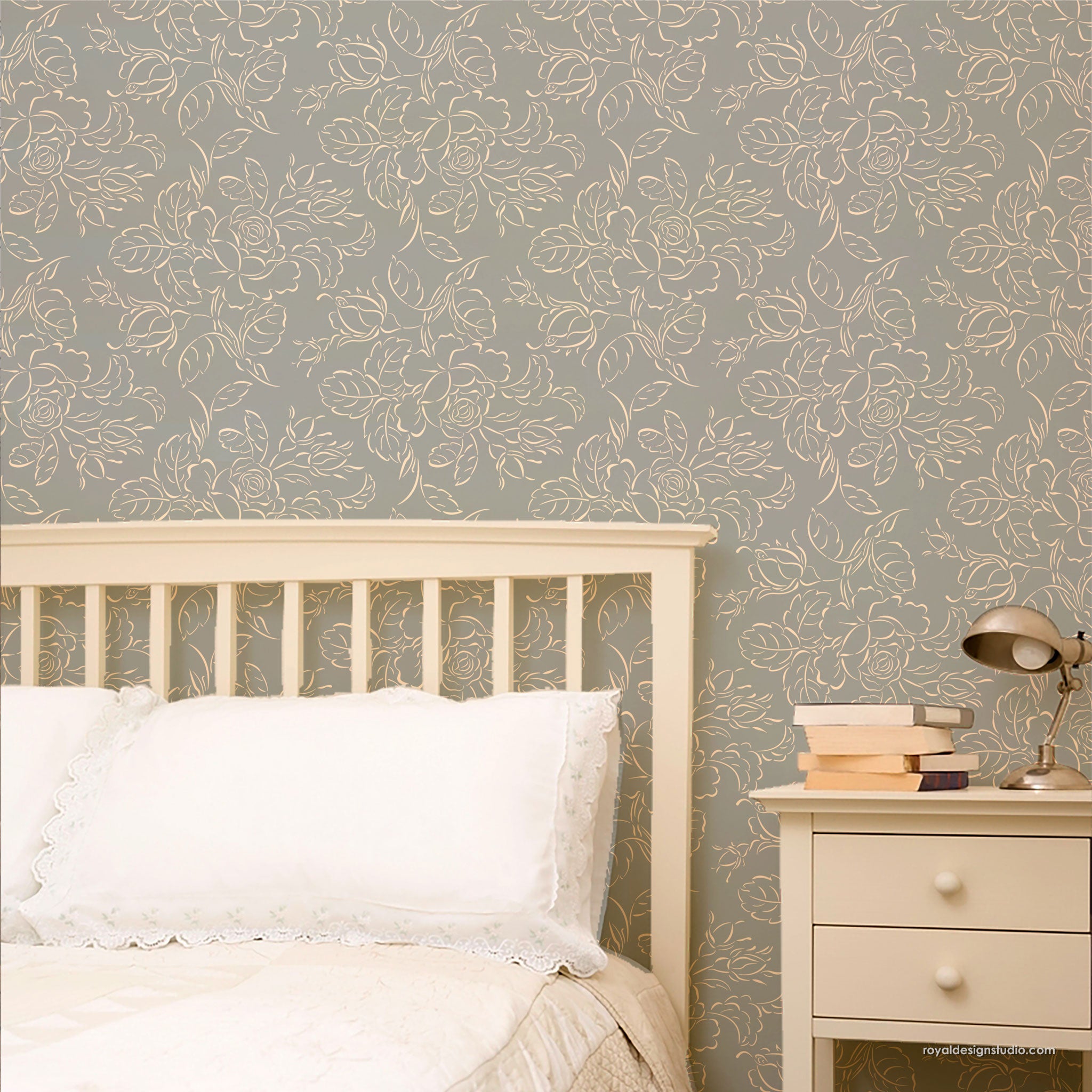 stenciled Bedroom with floral wallpaper painted with a large wall stencil, bed, and nightstand.