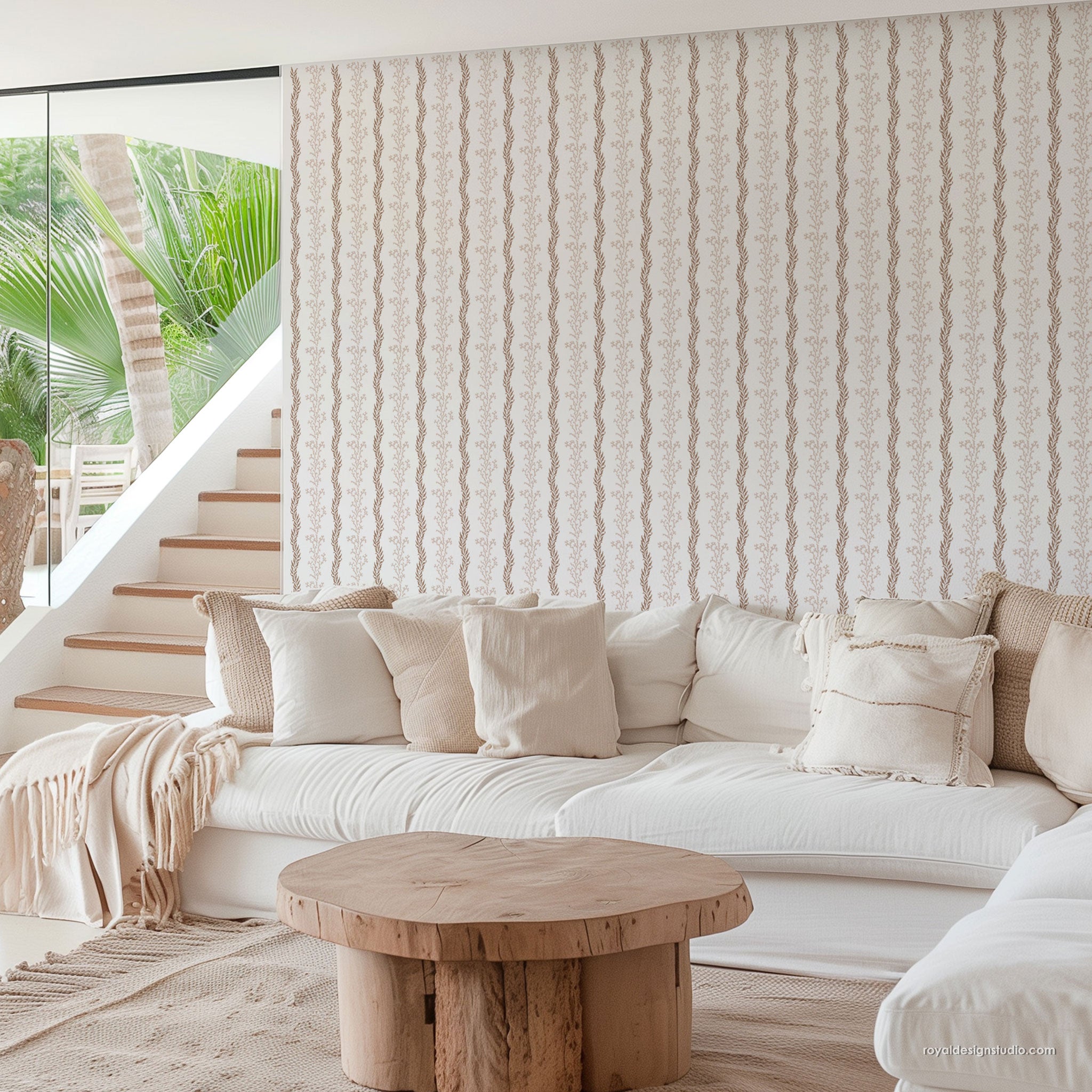 coastal style living room in neutral colors with  coral stripe wall stencil