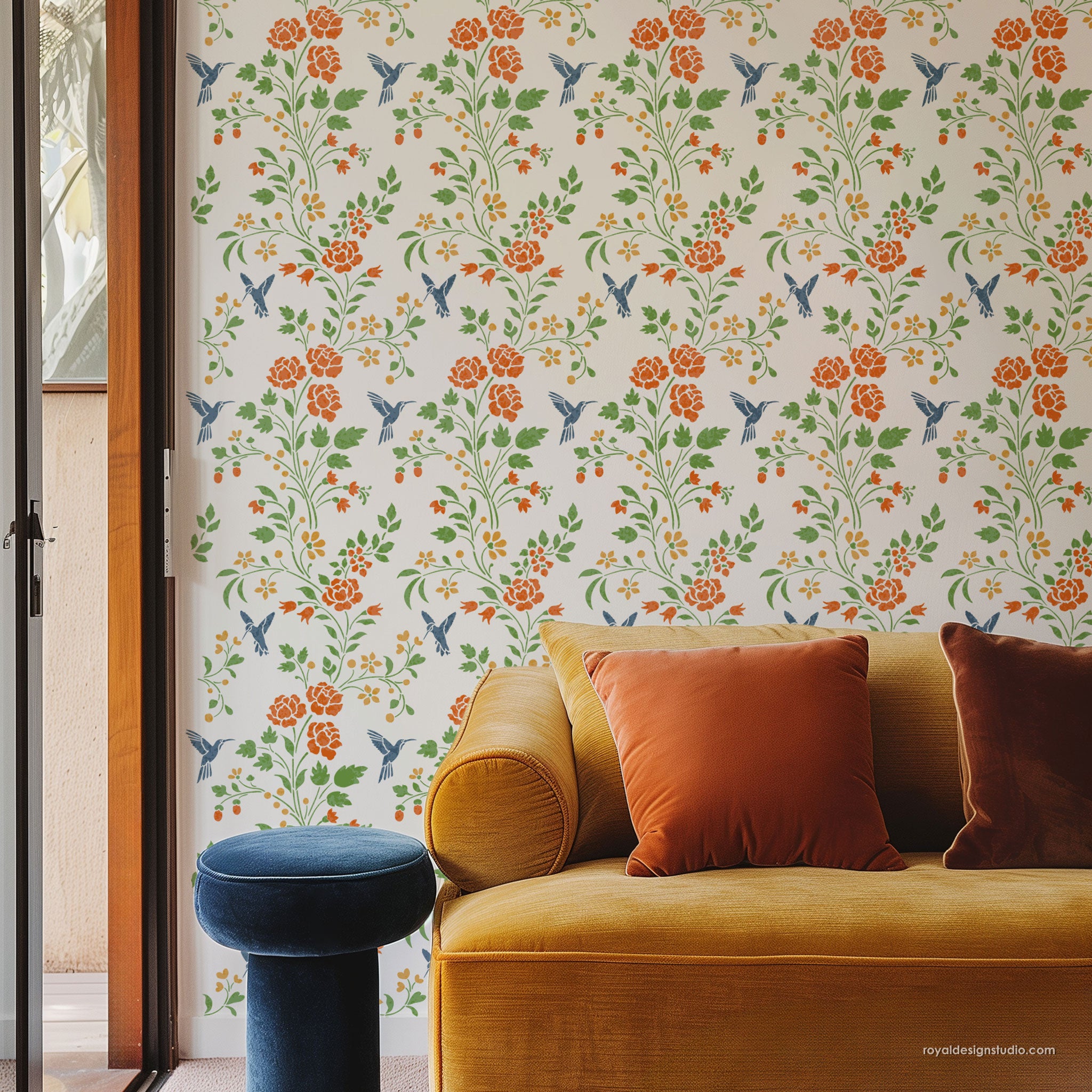 Large Chinoiserie wall stencil pattern stenciled with orange flowers and blue birds in a living room